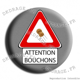 Badge Attention bouchons